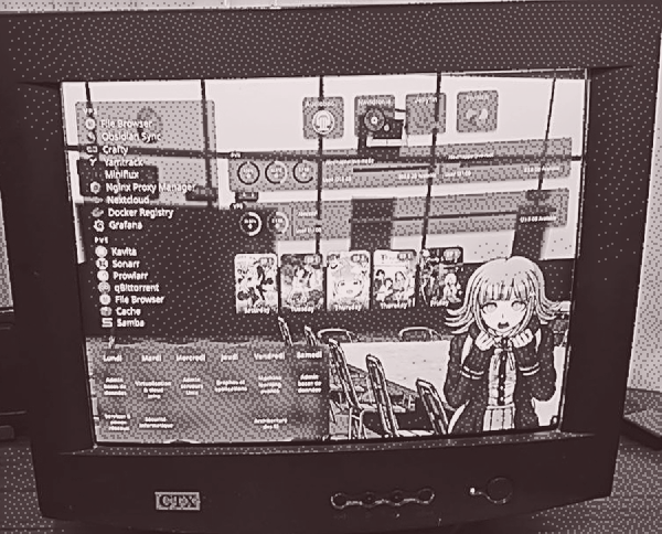 an old CTX CRT monitor showing the homelab dashboard